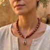 Collar artesanal de piedras naturales en jaspe rojo con dije de plata