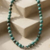 Collar artesanal de piedras naturales en turquesa y dije de plata