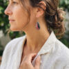 Aretes artesanales de plata y rodonita rosa y negro en forma de lágrima