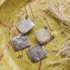 Joyería artesanal : aretes de plata forjada a mano dos rombos